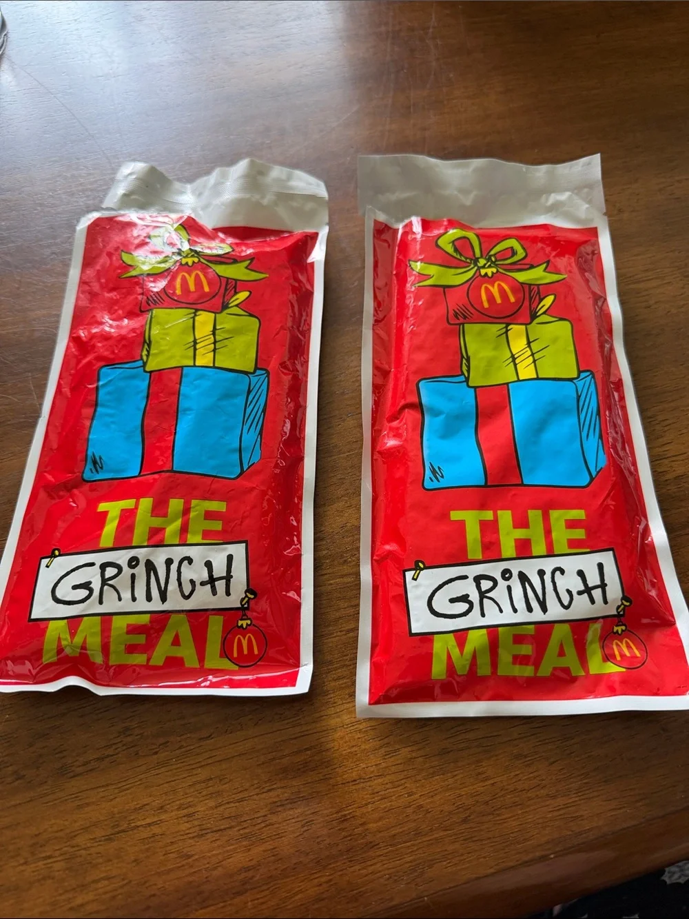 McDonald's Red Grinch Meal Bags with Green & Yellow socks